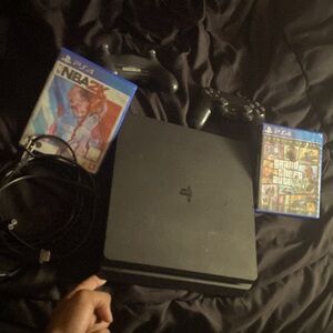 PlayStation4 with 2 black controllers,GTA 5 & 2k22,Headset,Plus FortniteAccount